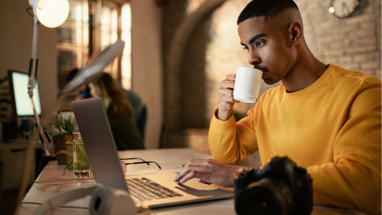 College student drinking coffee